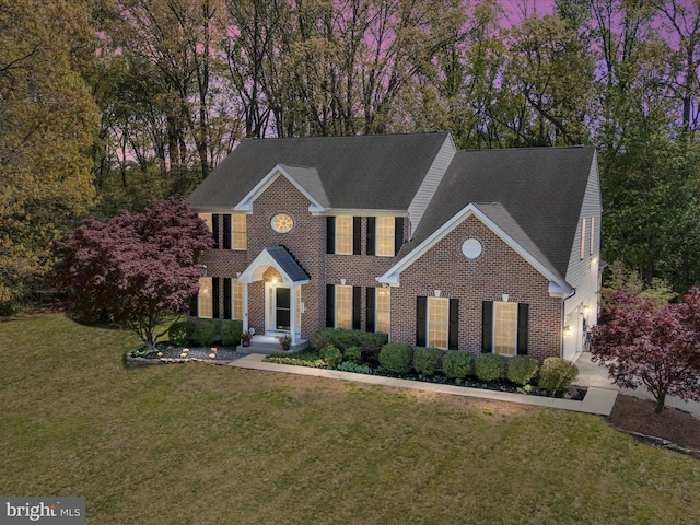 8283 Waterford Mill Ct, Pasadena, MD 21122 - colonial house featuring brick siding and a front yard