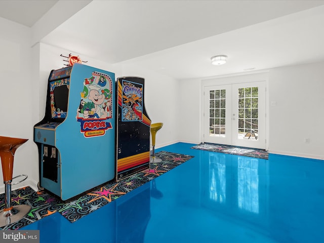 8283 Waterford Mill Ct, Pasadena, MD 21122 - recreation room featuring baseboards and french doors