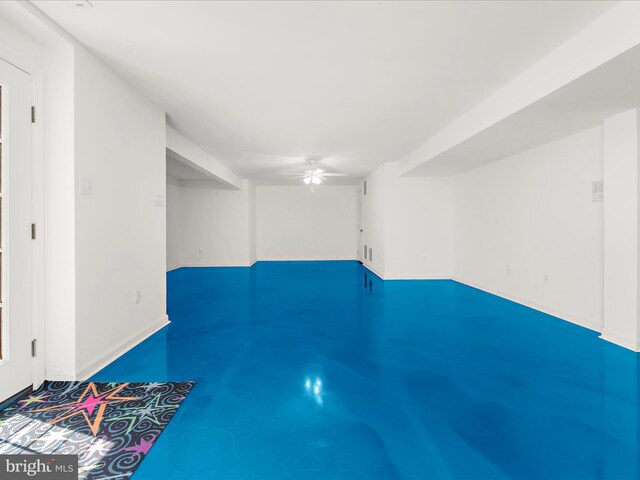 8283 Waterford Mill Ct, Pasadena, MD 21122 - finished basement with a ceiling fan and baseboards