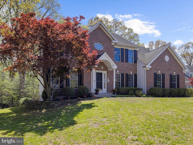 8283 Waterford Mill Ct, Pasadena, MD 21122 - view of front of house featuring brick siding and a front lawn