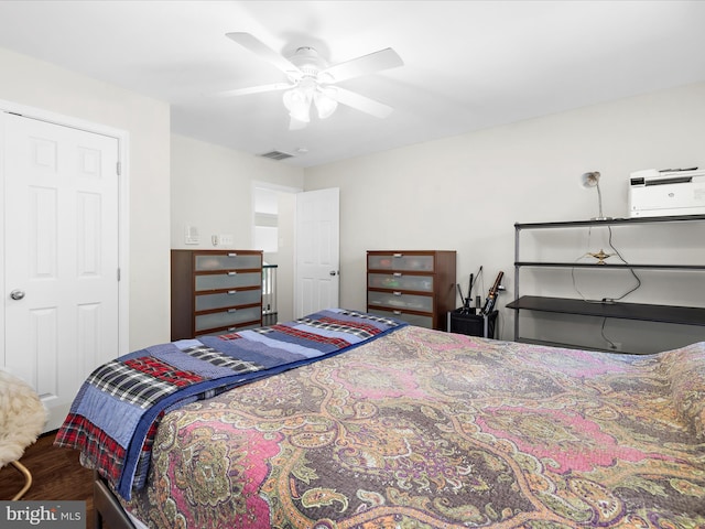 8283 Waterford Mill Ct, Pasadena, MD 21122 - bedroom with ceiling fan, wood finished floors, and visible vents