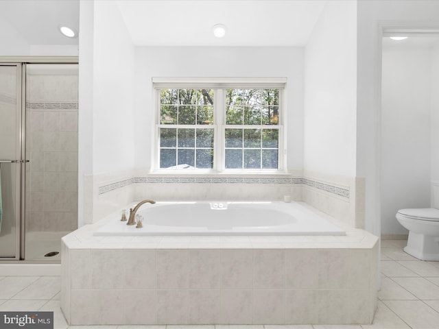 8283 Waterford Mill Ct, Pasadena, MD 21122 - full bath featuring toilet, tile patterned floors, recessed lighting, a garden tub, and a stall shower