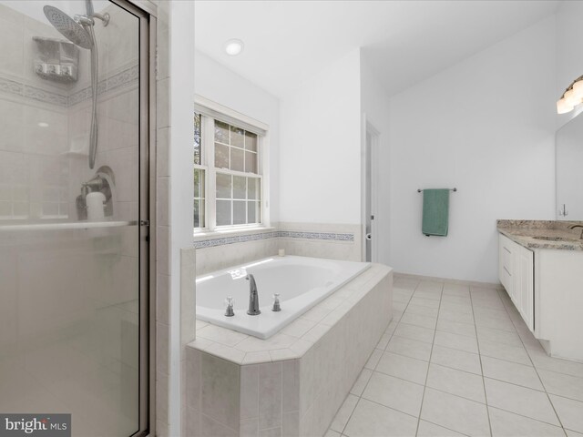 8283 Waterford Mill Ct, Pasadena, MD 21122 - full bath with vanity, tile patterned flooring, a bath, and a stall shower