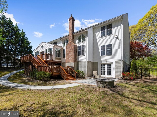 8283 Waterford Mill Ct, Pasadena, MD 21122 - back of house featuring a chimney, french doors, a deck, stairway, and an outdoor fire pit