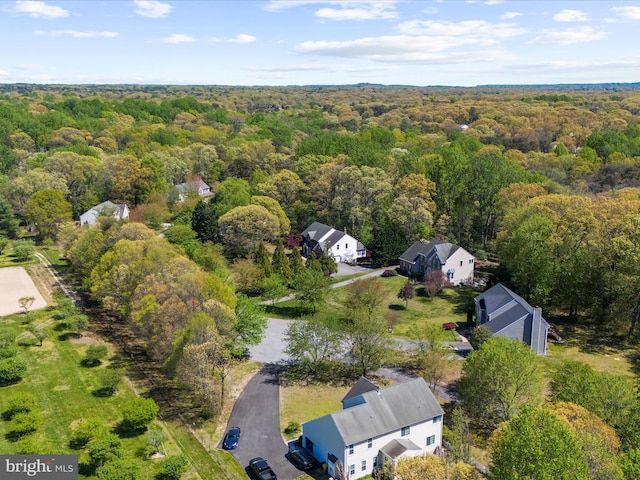 8283 Waterford Mill Ct, Pasadena, MD 21122 - drone / aerial view featuring a wooded view