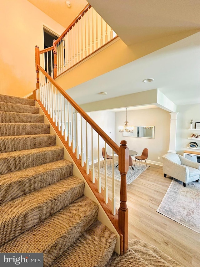 2206 Greywing St, Woodbridge, VA 22191 - staircase with a chandelier, wood finished floors, baseboards, and recessed lighting
