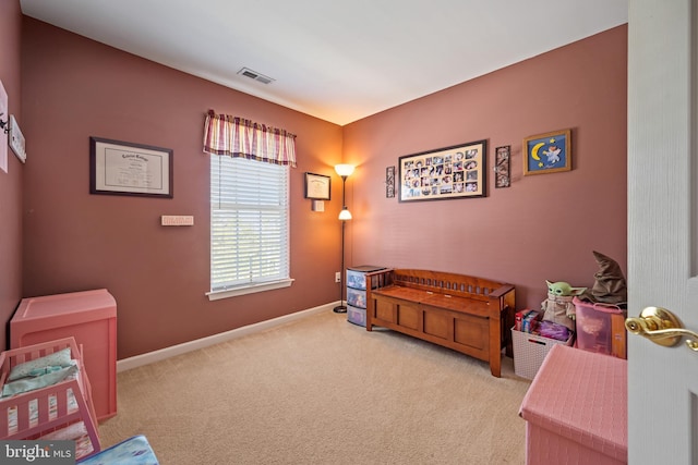 bedroom featuring baseboards, carpet, and visible vents
