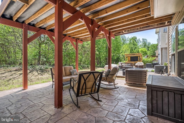view of patio featuring outdoor lounge area and central AC