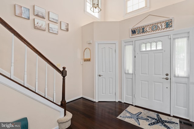 5229 Woodleaf Ct, Centreville, VA 20120 - entrance foyer featuring stairway, dark wood-type flooring, baseboards, and a high ceiling