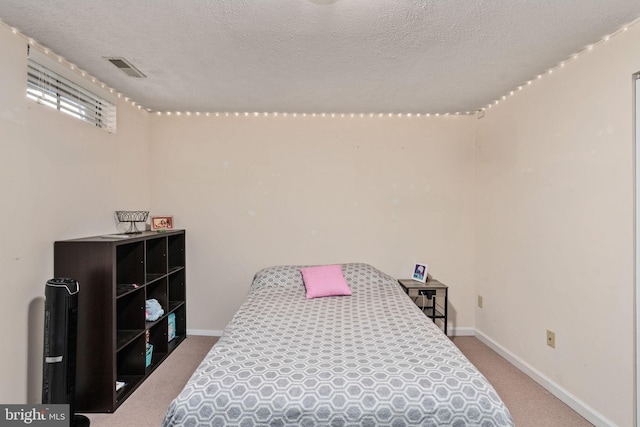 5229 Woodleaf Ct, Centreville, VA 20120 - carpeted bedroom featuring a textured ceiling and baseboards