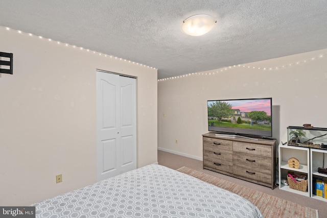 5229 Woodleaf Ct, Centreville, VA 20120 - bedroom with a textured ceiling, carpet, and a closet