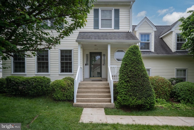 5229 Woodleaf Ct, Centreville, VA 20120 - view of front of house with a shingled roof, covered porch, and a front yard