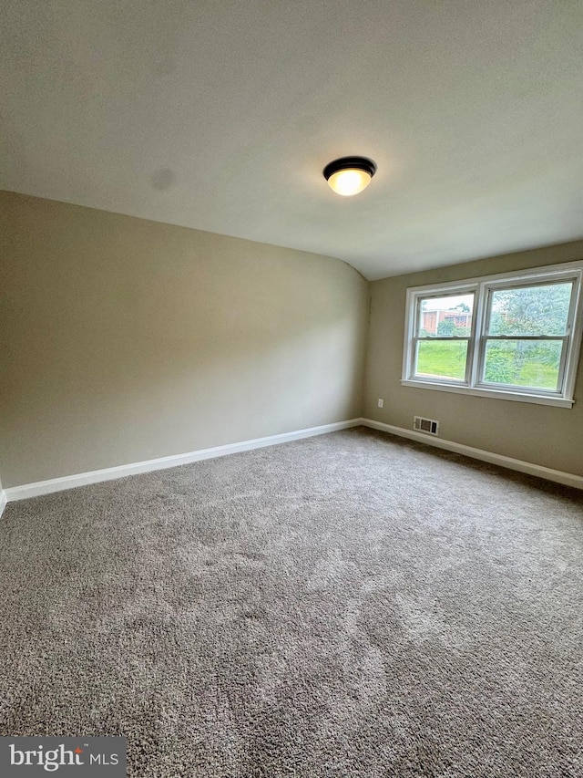 1333 E Northern Pkwy, Baltimore, MD 21239 - carpeted spare room featuring baseboards