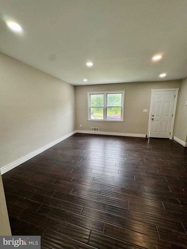 1333 E Northern Pkwy, Baltimore, MD 21239 - unfurnished room featuring recessed lighting, dark wood-style floors, and baseboards