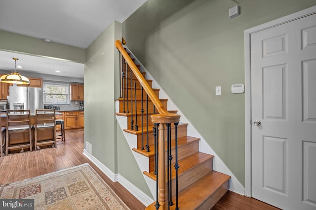 3219 Sunset Ave, Norristown, PA 19403 - stairway with wood finished floors and baseboards