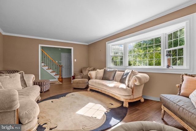 3219 Sunset Ave, Norristown, PA 19403 - living room featuring wood finished floors, ornamental molding, stairs, and baseboards