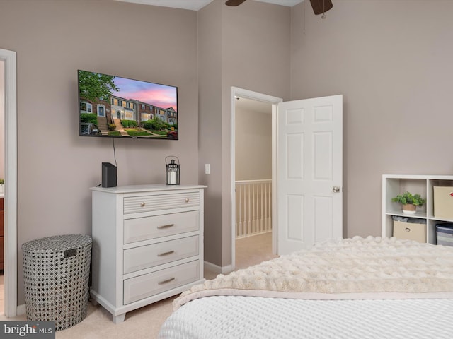 bedroom with light carpet