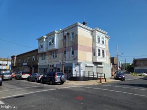 view of property with uncovered parking