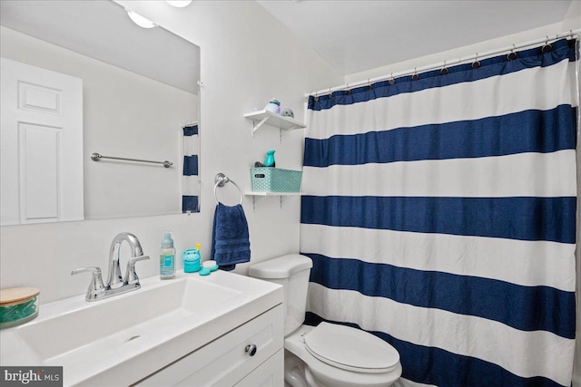 1653 Forest Park, District Heights, MD 20747 - bathroom featuring toilet, a shower with curtain, and vanity