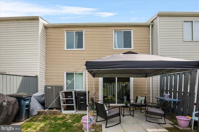 1653 Forest Park, District Heights, MD 20747 - rear view of property with fence, a gazebo, cooling unit, and a patio area