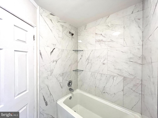 full bath featuring shower / bath combination