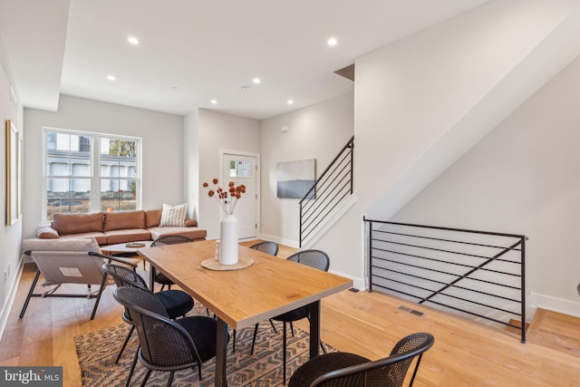 dining space featuring recessed lighting, baseboards, visible vents, and light wood-type flooring