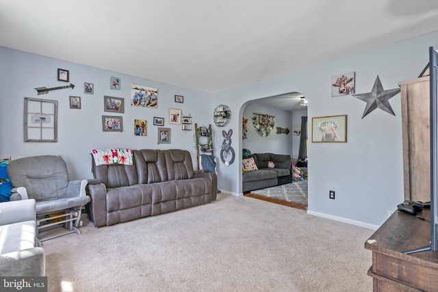 13 Maricopa Trl, Browns Mills, NJ 08015 - carpeted living room with arched walkways and baseboards