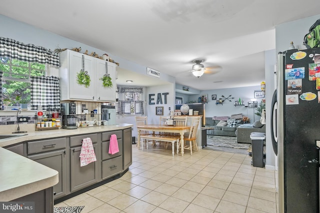 13 Maricopa Trl, Browns Mills, NJ 08015 - kitchen featuring a ceiling fan, light countertops, white cabinets, freestanding refrigerator, and light tile patterned flooring