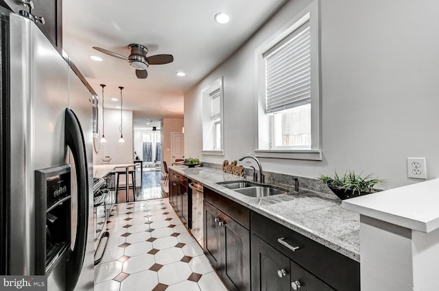 136 W Ostend St, Baltimore, MD 21230 - kitchen featuring stainless steel appliances, a sink, a ceiling fan, plenty of natural light, and recessed lighting