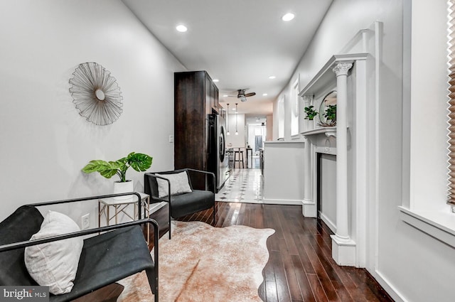 136 W Ostend St, Baltimore, MD 21230 - hallway with decorative columns, dark wood-style flooring, and recessed lighting