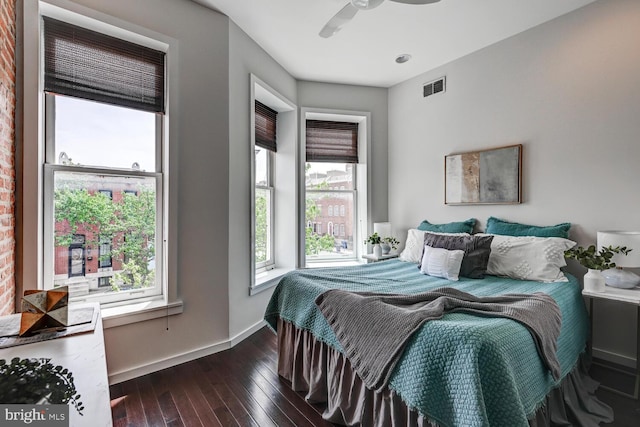 136 W Ostend St, Baltimore, MD 21230 - bedroom with dark wood-style floors, baseboards, and ceiling fan