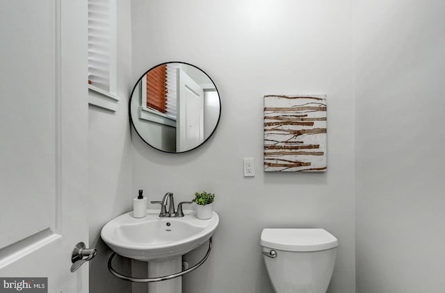 136 W Ostend St, Baltimore, MD 21230 - bathroom with toilet and a sink
