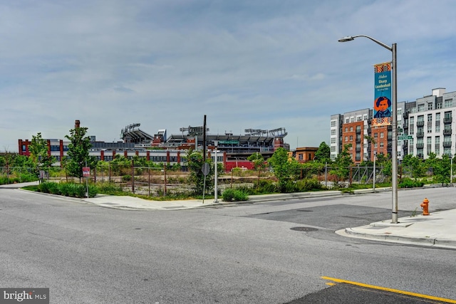 136 W Ostend St, Baltimore, MD 21230 - view of asphalt road featuring sidewalks, curbs, and street lighting