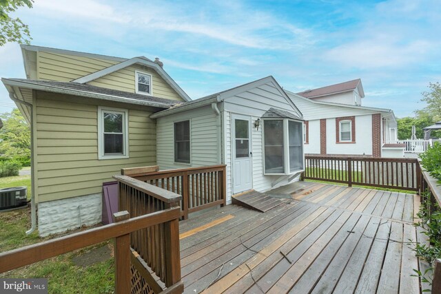 wooden terrace featuring central AC
