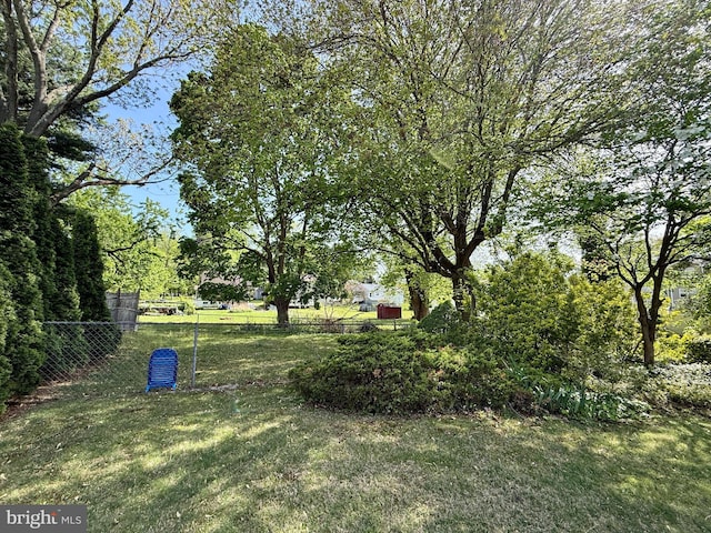 view of yard with fence