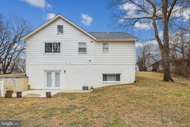 4527 Deer Park Dr, Temple Hills, MD 20748 - back of property with a lawn, a shingled roof, a patio area, and french doors