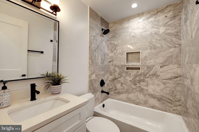 bathroom with toilet, shower / washtub combination, recessed lighting, and vanity