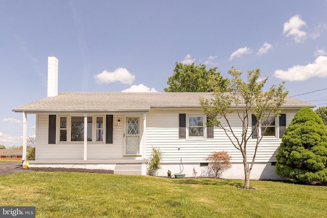 ranch-style home with crawl space and a front yard