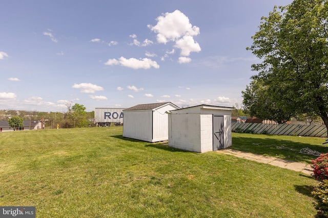 view of shed with fence