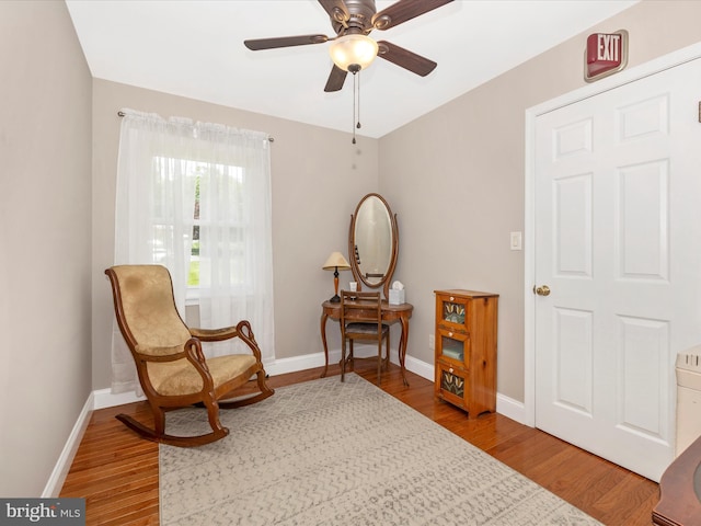 7214 Honeybush Dr, Mount Airy, MD 21771 - living area featuring wood finished floors, ceiling fan, and baseboards