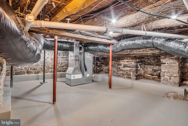unfinished basement with heating unit