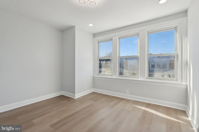 6227 Delancey St, Philadelphia, PA 19143 - empty room featuring baseboards, recessed lighting, and wood finished floors