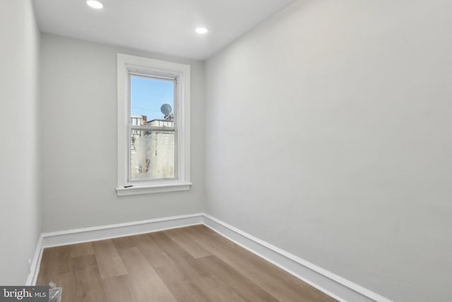 6227 Delancey St, Philadelphia, PA 19143 - empty room with baseboards, recessed lighting, and wood finished floors