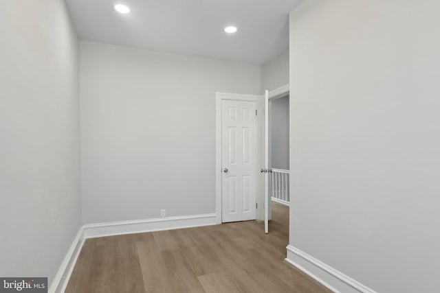 6227 Delancey St, Philadelphia, PA 19143 - interior space with baseboards, recessed lighting, and wood finished floors