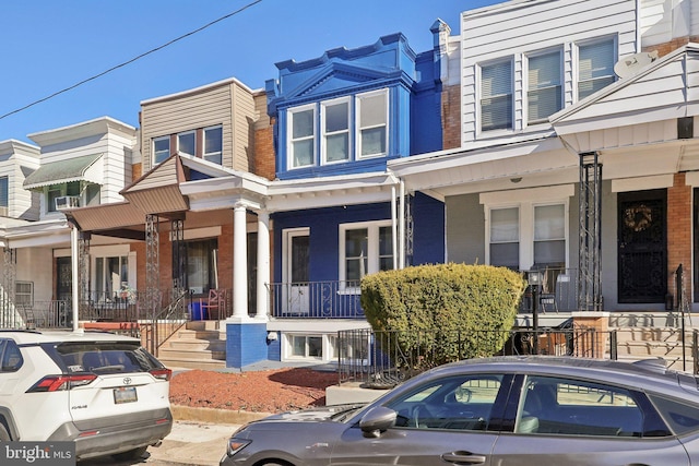 6227 Delancey St, Philadelphia, PA 19143 - multi unit property with a porch and brick siding