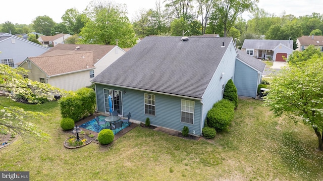 102 Lakebridge Dr, Deptford, NJ 08096 - back of house featuring a lawn, a patio area, roof with shingles, and a residential view