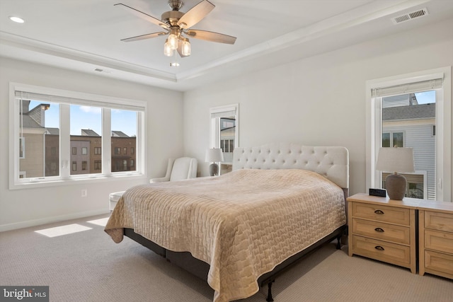 bedroom with baseboards, visible vents, recessed lighting, and light colored carpet