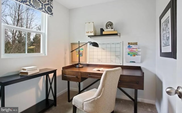 office space featuring baseboards