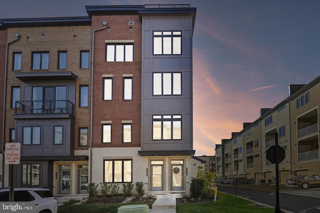 view of property at dusk