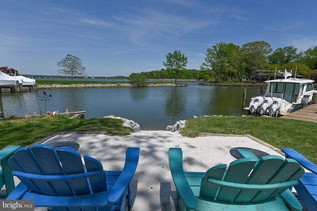 exterior space with a water view